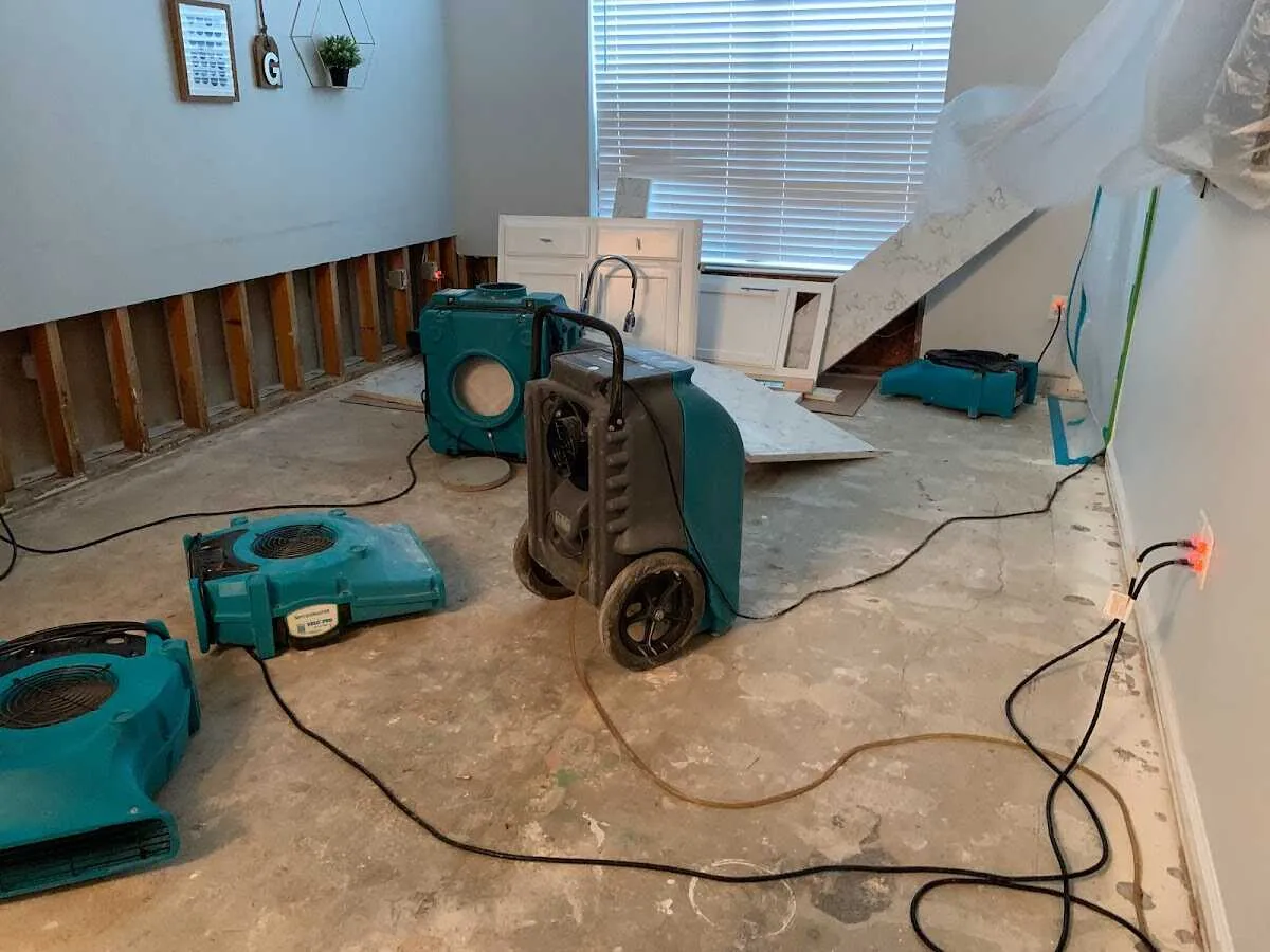 Dehumidifier in flood-cut room for Water Damage Restoration in Southport