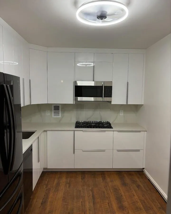 Renovated kitchen with quartz countertops in Southport